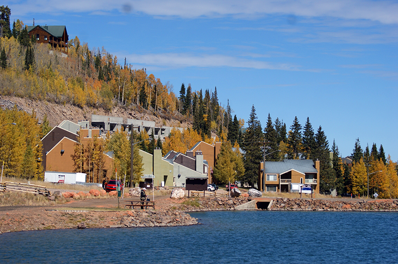 Brian Head Village Condos are right across the street from Bristlecone Pond in Brian Head, Utah. Here you can see the condos in the background and the pond in the foreground. We took this photo in fall of 2019.